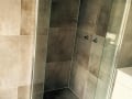 Sandstone shower tiling Mermaid Tiling